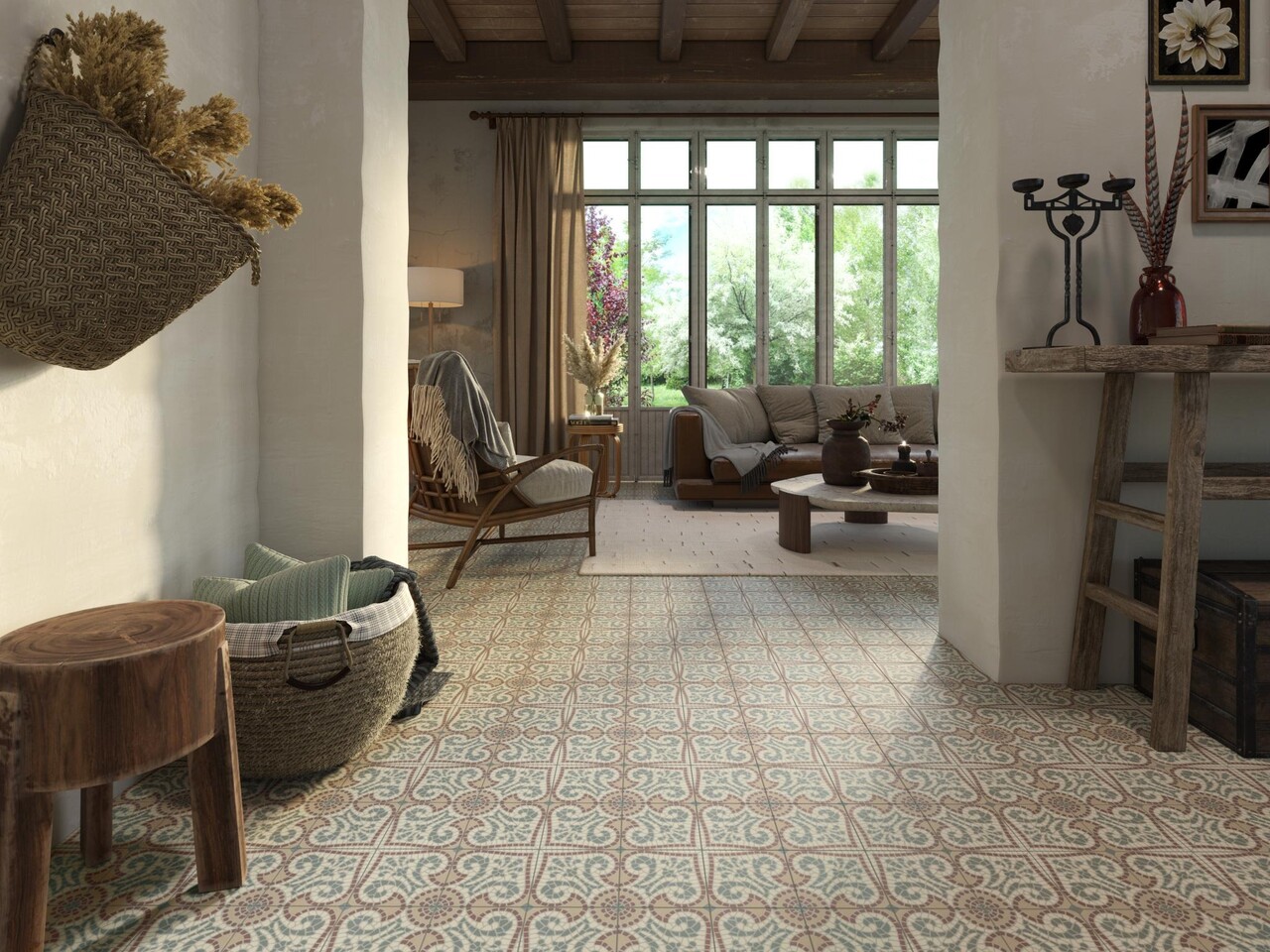 Sol en carrelage effet carreaux de ciment à motifs dans une maison de campagne aux poutres apparentes