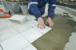 tilers at industrial floor tiling renovation
